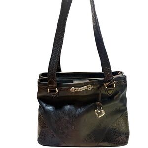 Brighton shoulder bag features black pebbled leather and silver-tone hardware